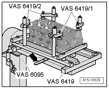Removing and installing valve stem seals (cylinder head removed)