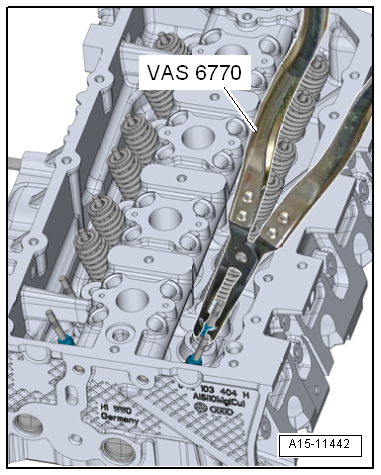 Removing and installing valve stem seals (cylinder head removed)