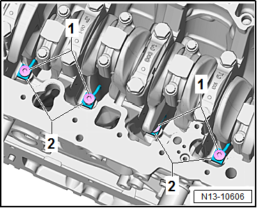 Removing and installing oil spray jets